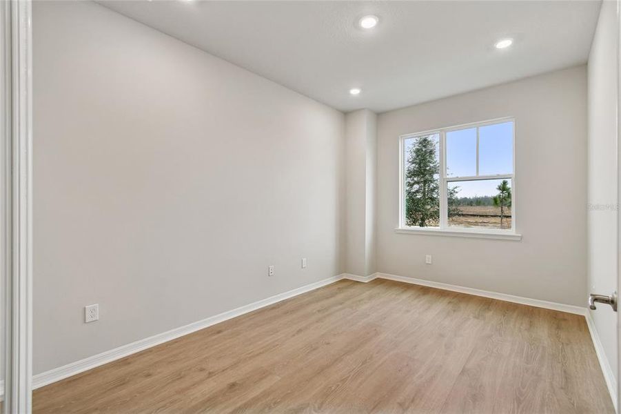 Spacious, unfurnished interior of a new home in Laureate Park at Lake Nona - Garden Series, Orlando (Image 16).