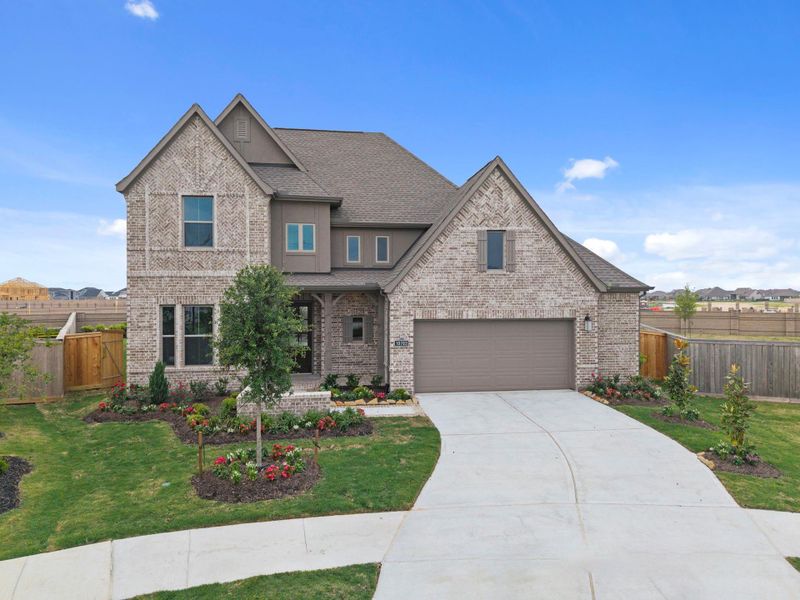 Front exterior of a new home in Bridgeland, Cypress, TX, highlighting curb appeal (Image 21).