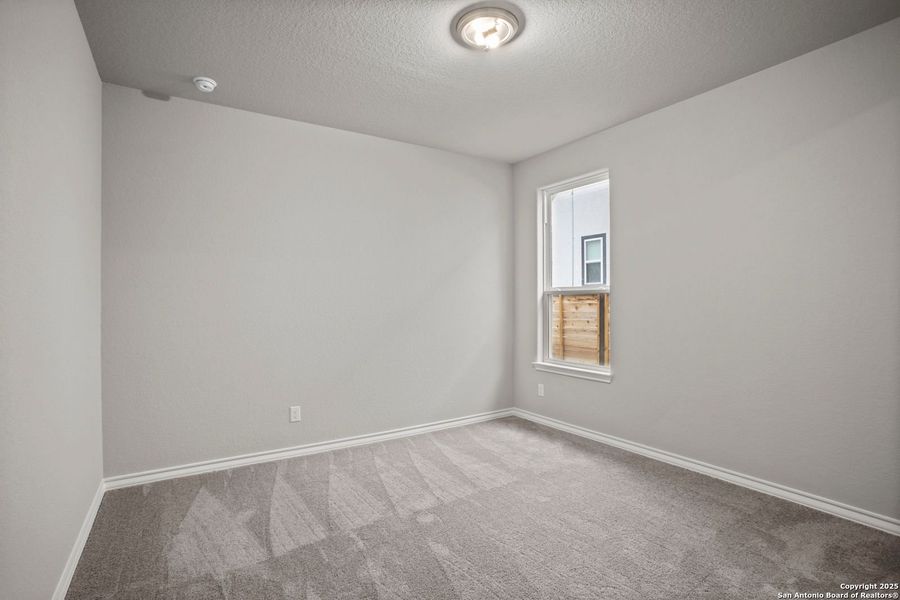 Spacious, unfurnished interior of a new home in Potranco Oaks, Castroville (Image 34).