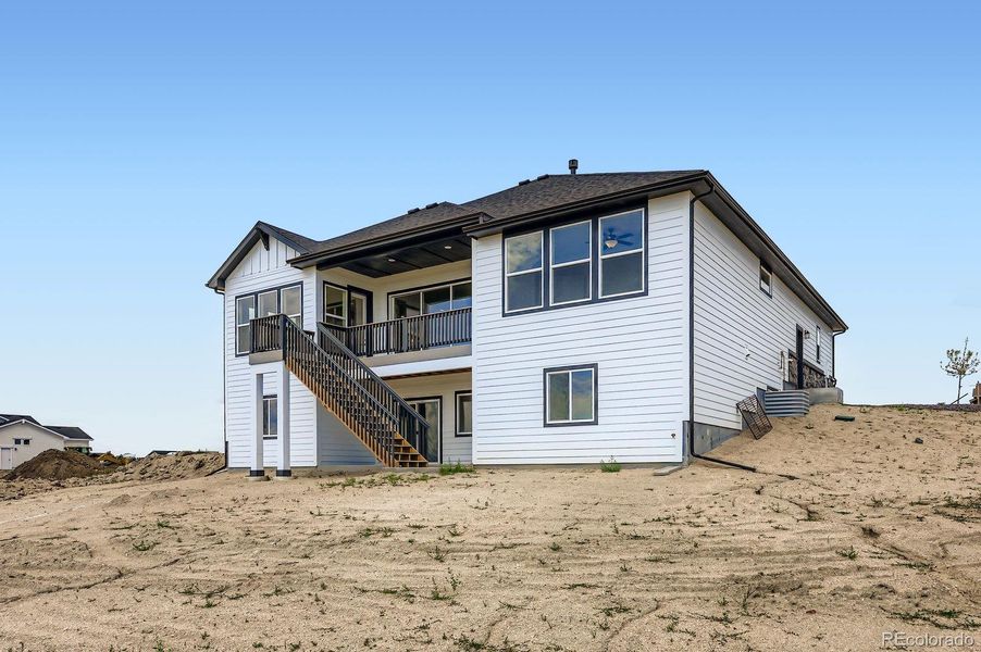 Front exterior of a new home in Timber Ridge, Colorado Springs, CO, highlighting curb appeal (Image 17).
