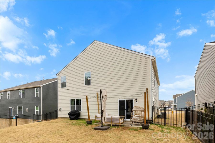 Exterior details and patio area of a home in Calvin Creek, Troutman (Image 22).