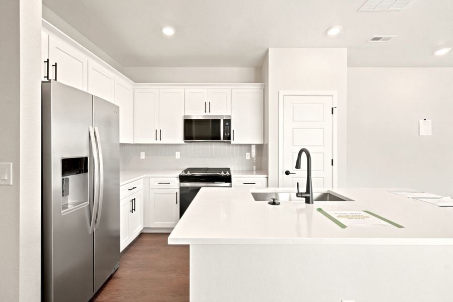 Furnished interior view inside a new home in Sky Ranch, Watkins (Image 6).