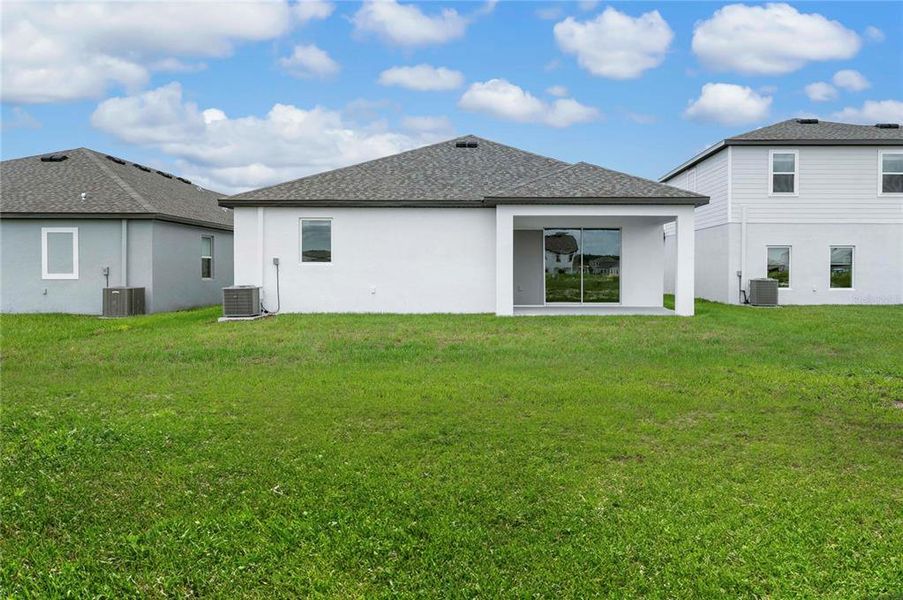 Exterior details and patio area of a home in Gum Lake Preserve, Lake Alfred (Image 3).