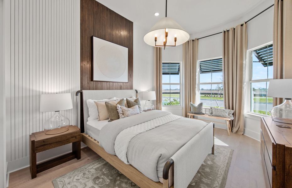 Representative furnished interior of a home built from the Layton Grande by DiVosta in BeachWalk by Manasota Key, Englewood (Image 33).