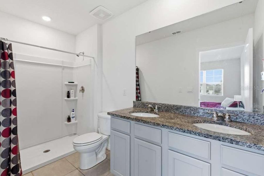 Furnished interior view inside a new home in Brentwood, Davenport (Image 12).