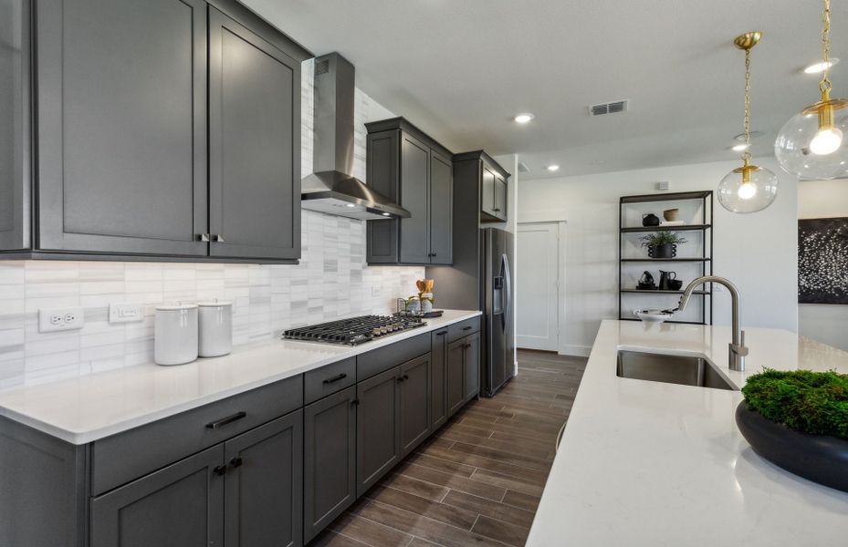 Spacious kitchen with recessed lighting