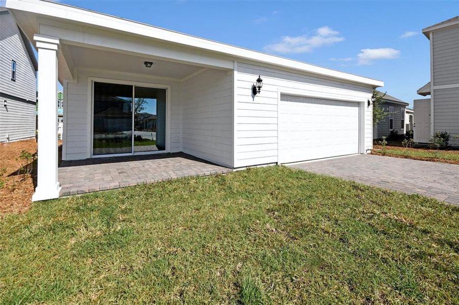 Front exterior of a new home in , St. Cloud, FL, highlighting curb appeal (Image 21).