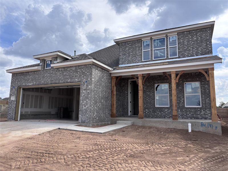 Exterior details and patio area of a home in The Colony 50s, Bastrop (Image 2). Exterior details and patio area of a home in The Colony 50s, Bastrop (Image 2).