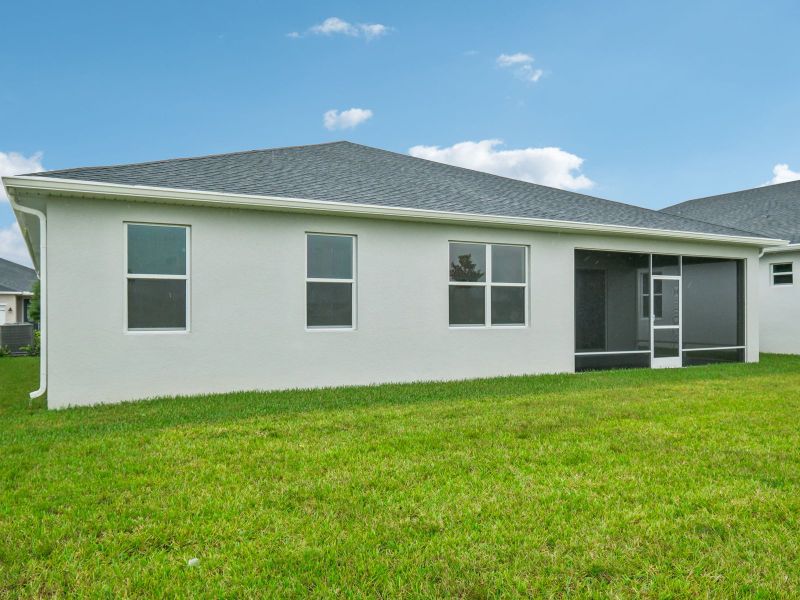 Exterior of the Coral floorplan at 6398 NW Sweetwood Dr