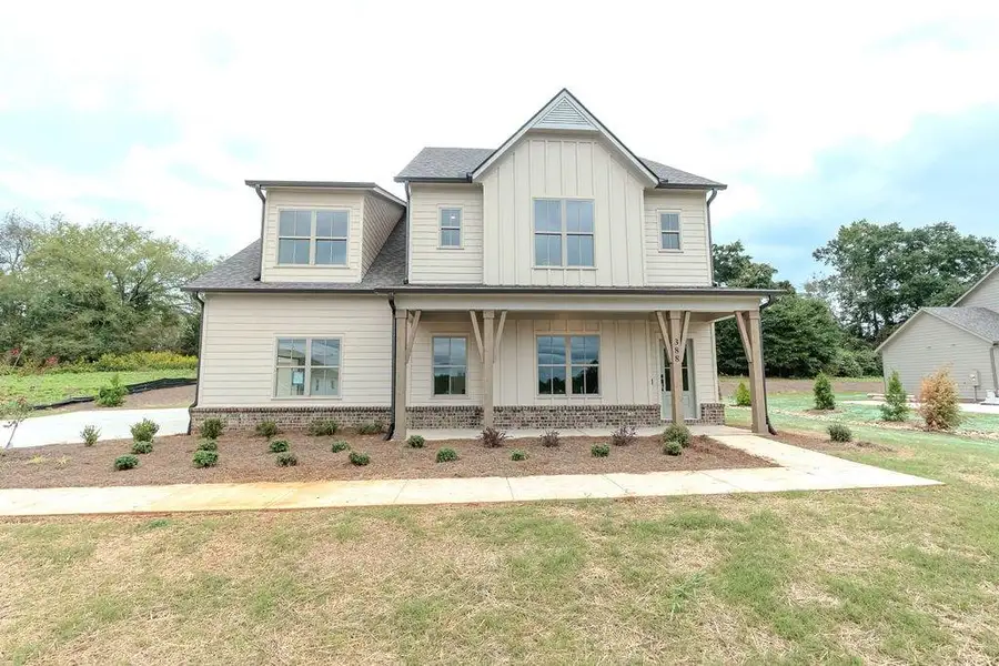 Front exterior of a new home in , Hoschton, GA, highlighting curb appeal (Image 26).