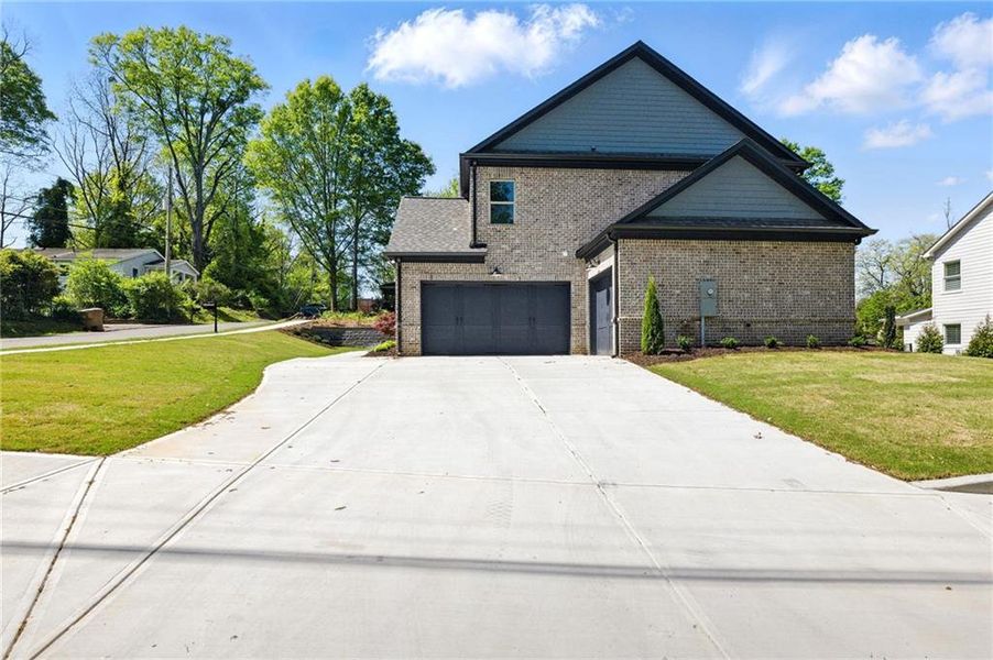 Front exterior of a new home in , Buford, GA, highlighting curb appeal (Image 23).