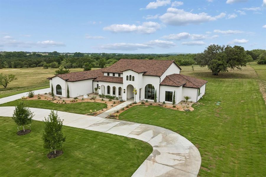 Front exterior of a new home in , Weatherford, TX, highlighting curb appeal (Image 24). Front exterior of a new home in , Weatherford, TX, highlighting curb appeal (Image 24).