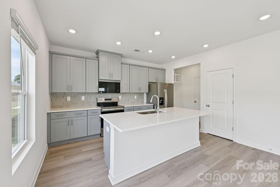 Photo is not of the actual home, but is an inspirational photo of builder’s model home and may depict options, furnishings, and/or decorator features that are not included Photo is not of the actual home, but is an inspirational photo of builder’s model home and may depict options, furnishings, and/or decorator features that are not included