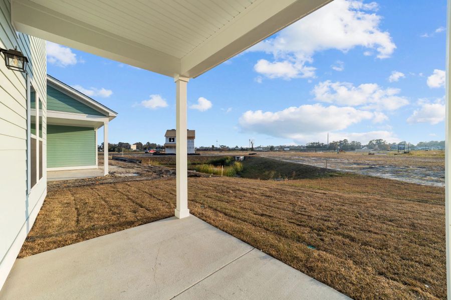 Exterior details and patio area of a home in Blue Heron Retreat: Oasis Series, Little River (Image 3). Exterior details and patio area of a home in Blue Heron Retreat: Oasis Series, Little River (Image 3).