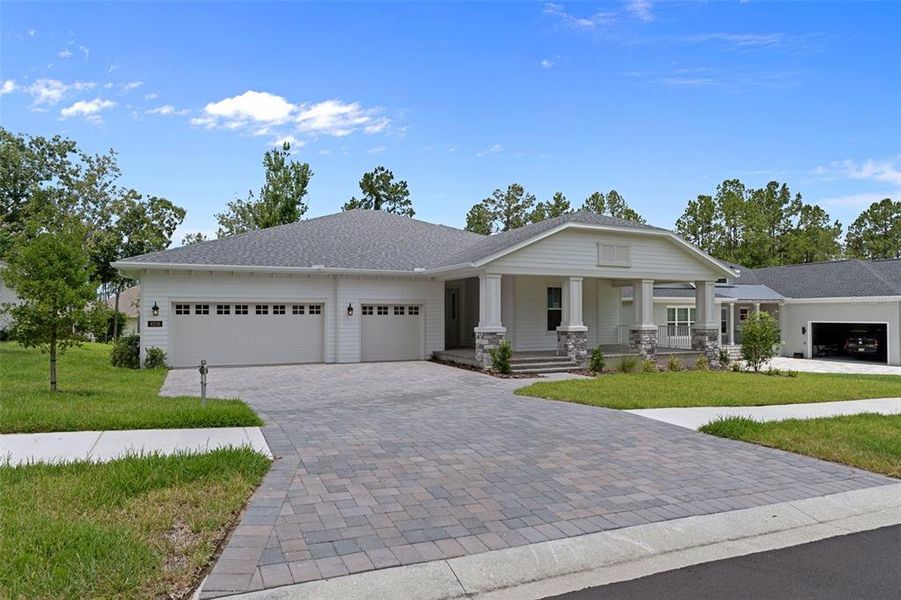 Front exterior of a new home in Southern Hills Plantation, Brooksville, FL, highlighting curb appeal (Image 2). Front exterior of a new home in Southern Hills Plantation, Brooksville, FL, highlighting curb appeal (Image 2).