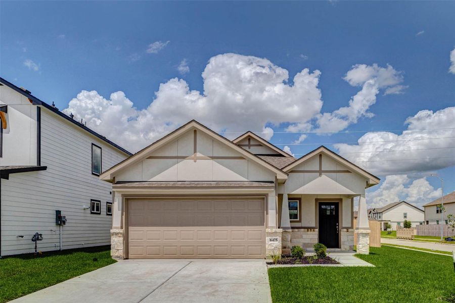 A straight-on view showcases the home’s attractive front elevation, spacious driveway, and two-car garage. The covered porch, black front door, stone accents, and neutral exterior palette give the property a polished look, while the large front yard adds to the clean, welcoming curb appeal. A straight-on view showcases the home’s attractive front elevation, spacious driveway, and two-car garage. The covered porch, black front door, stone accents, and neutral exterior palette give the property a polished look, while the large front yard adds to the clean, welcoming curb appeal.