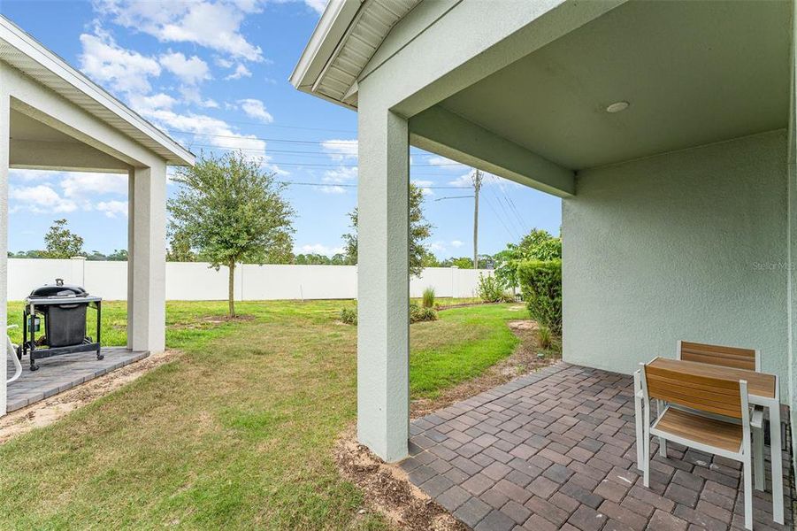 Front exterior of a new home in , Kissimmee, FL, highlighting curb appeal (Image 25).