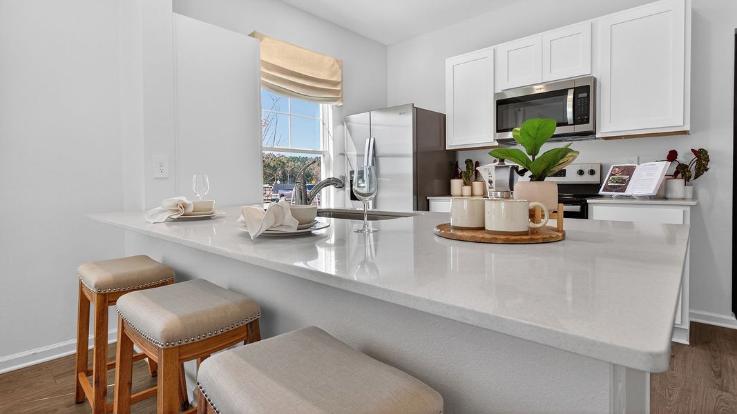 Representative furnished interior of a home built from the Baxter by D.R. Horton in Liberty Cove, Yulee (Image 9).