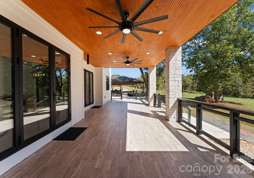 Exterior details and patio area of a home in , Statesville (Image 28).