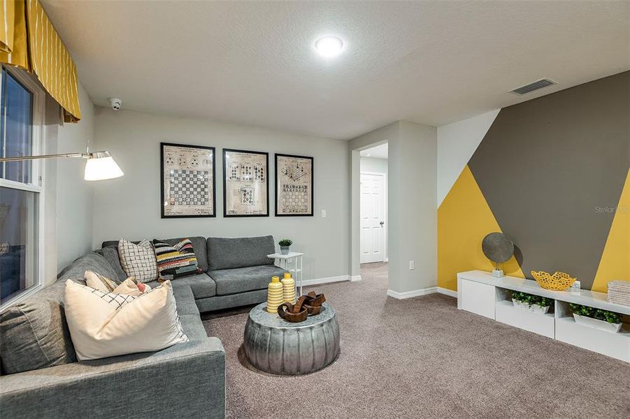 Furnished interior view inside a new home in Scenic Terrace, Haines City (Image 15).