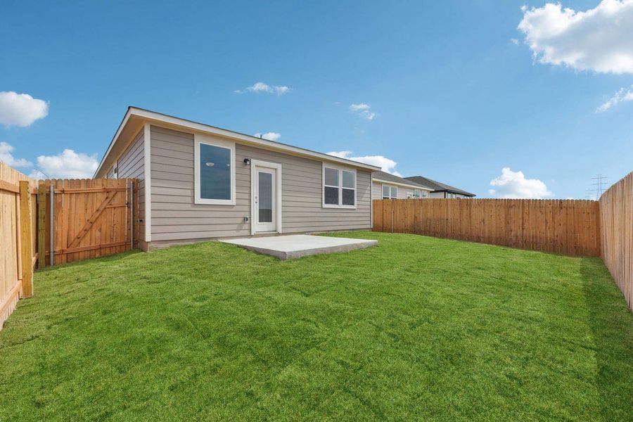 Exterior details and patio area of a home in Stallion Run, Buda (Image 3).