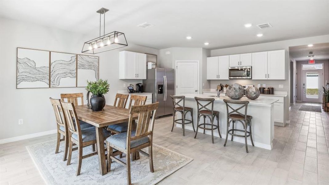 Furnished interior view inside a new home in Coral Lakes - Tradition & Express, Punta Gorda (Image 7).
