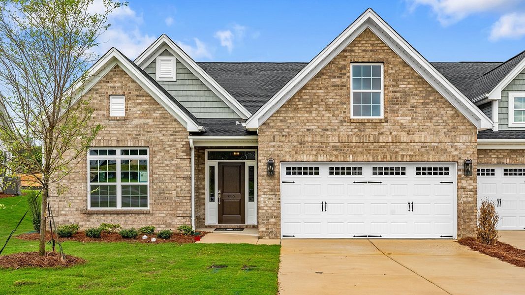 Front exterior of a new home in Fieldstone, Lexington, NC, highlighting curb appeal (Image 1).