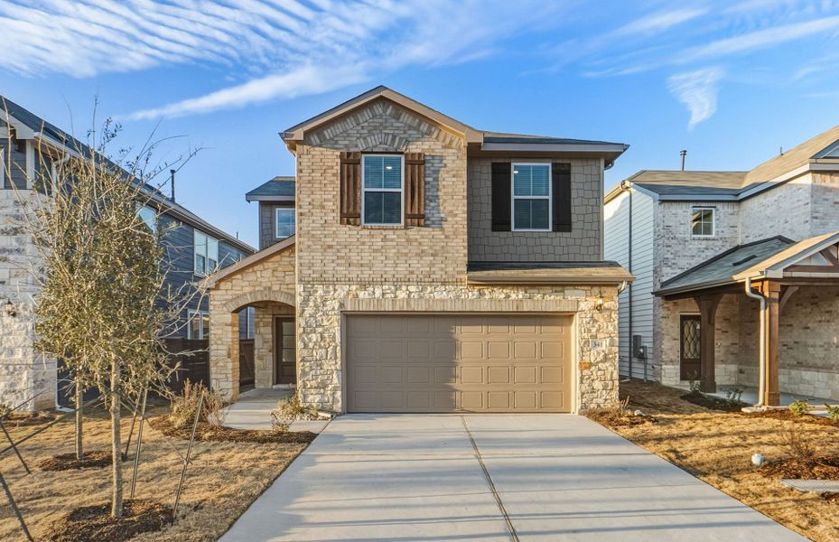 Front exterior of a new home in Horizon Lake, Leander, TX, highlighting curb appeal (Image 24).
