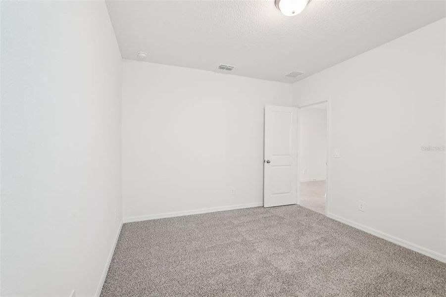 Spacious, unfurnished interior of a new home in Crosswinds - Signature Series, Haines City (Image 16).