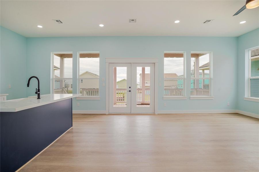 The front door opens to spaciious deck.