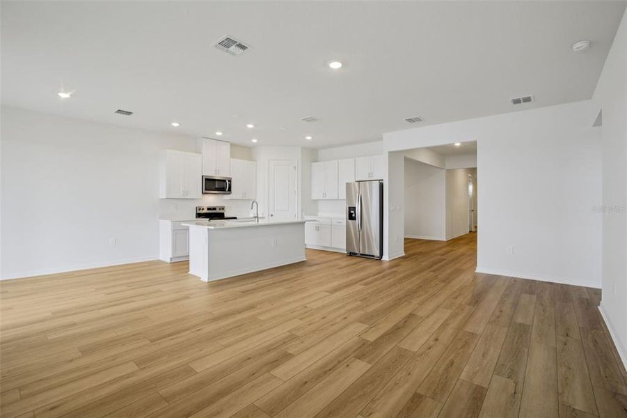 Spacious, unfurnished interior of a new home in Coasterra - Reserve Series, Palmetto (Image 23).