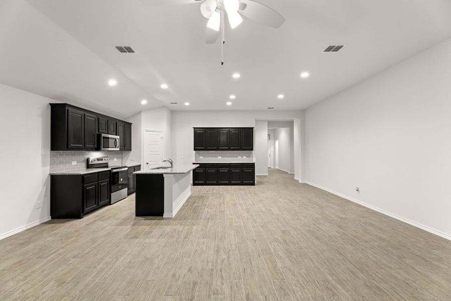 Representative exterior photo of a completed home built from the Austin by Impression Homes in DeBerry Reserve, Royse City, TX (Image 13). Representative exterior photo of a completed home built from the Austin by Impression Homes in DeBerry Reserve, Royse City, TX (Image 13).