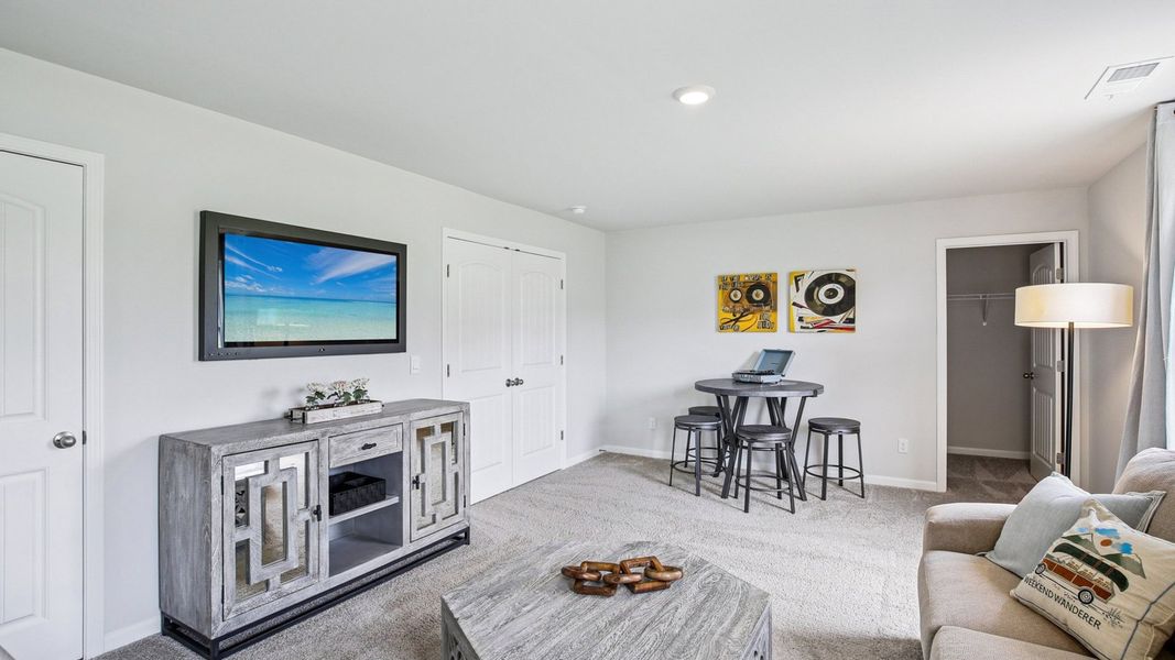 Furnished interior view inside a new home in The Parks, White House (Image 11).