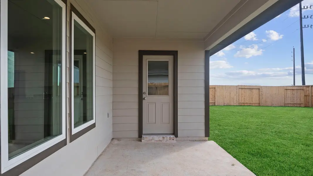 Exterior details and patio area of a home in Tamarron, Fulshear (Image 22).