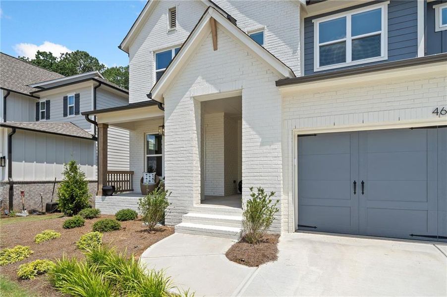 Front exterior of a new home in , Woodstock, GA, highlighting curb appeal (Image 33). Front exterior of a new home in , Woodstock, GA, highlighting curb appeal (Image 33).