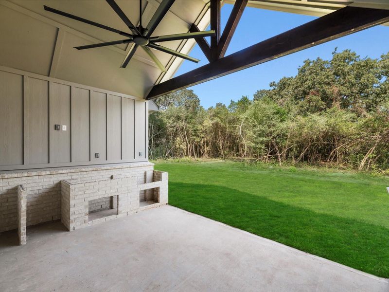 Back patio with plenty of space for a cozy sitting area and outdoor kitchen. Back patio with plenty of space for a cozy sitting area and outdoor kitchen.