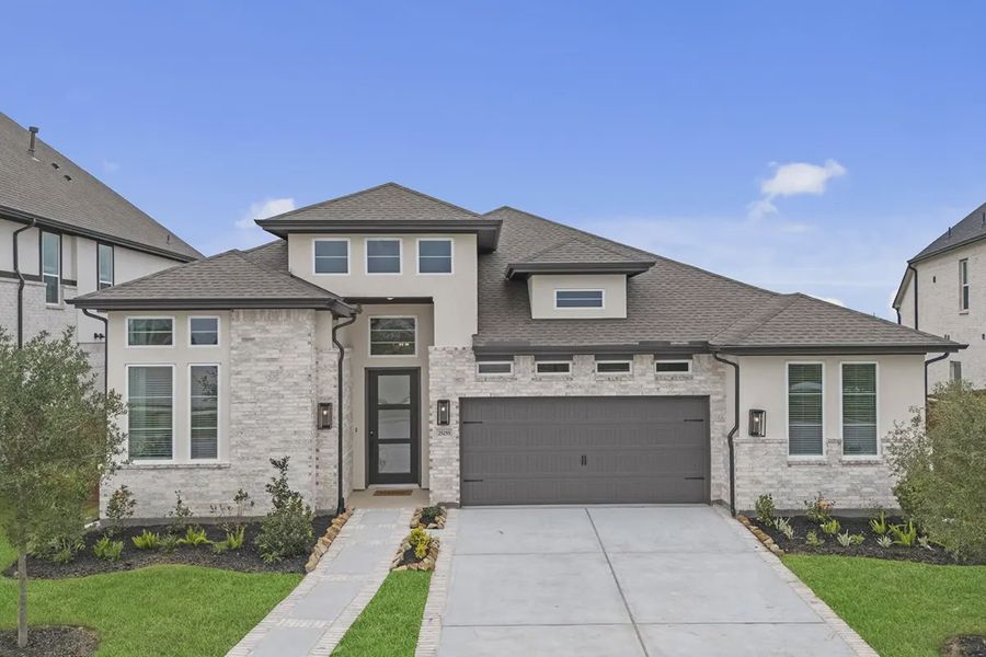 Representative exterior photo of a completed home built from the Sweetwater by Chesmar Homes in Steward Estates, Conroe, TX (Image 22). Representative exterior photo of a completed home built from the Sweetwater by Chesmar Homes in Steward Estates, Conroe, TX (Image 22).
