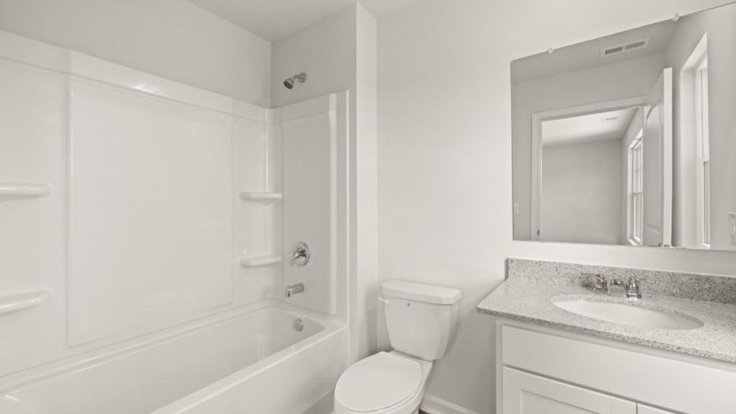 Furnished interior view inside a new home in Fairway 17 at Mirror Lake, Villa Rica (Image 7).