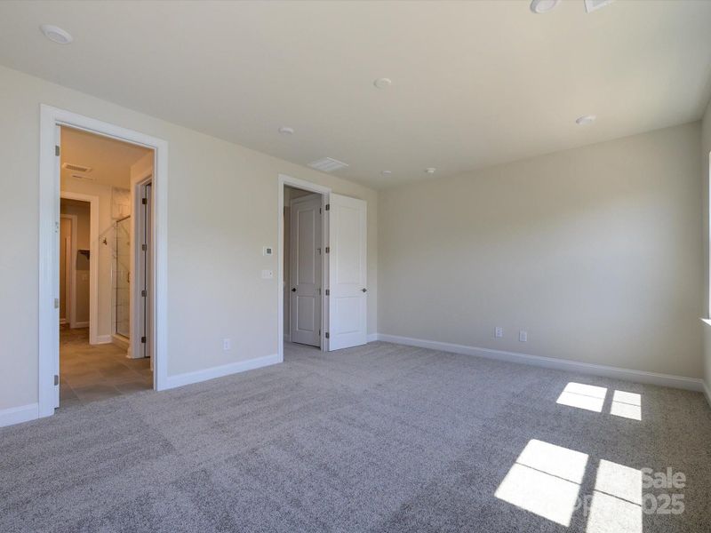 9' Ceilings and 8' Doorways at Primary Suite
