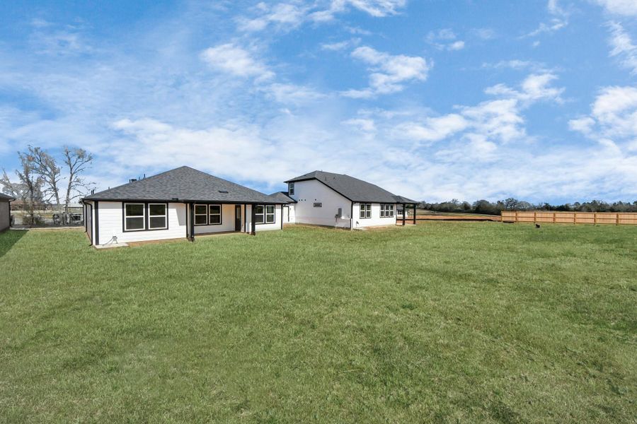Exterior details and patio area of a home in Montgomery Ridge: Landmark Collection, Montgomery (Image 4).