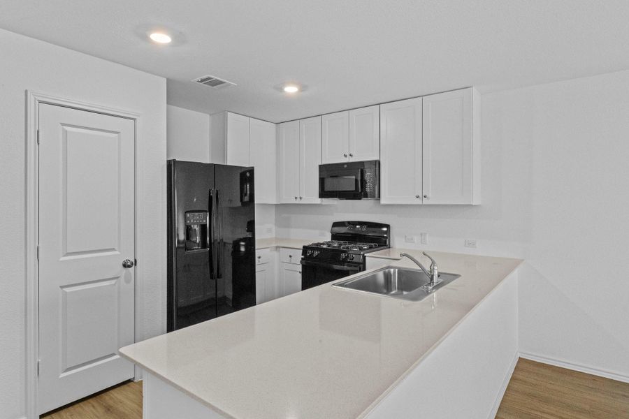 Furnished interior view inside a new home in Sunset Oaks, San Marcos (Image 5).