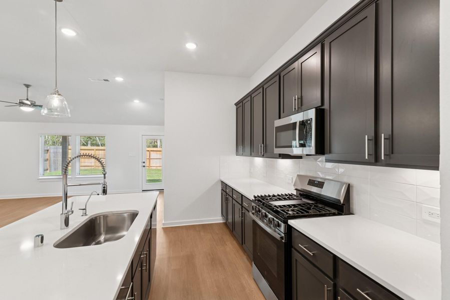 Furnished interior view inside a new home in Pinewood at Grand Texas, New Caney (Image 4).