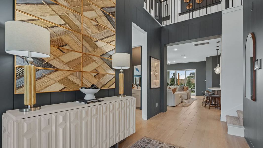 Representative furnished interior of a home built from the Acadia by Chesmar Homes in Elyson 50's, Katy (Image 5).