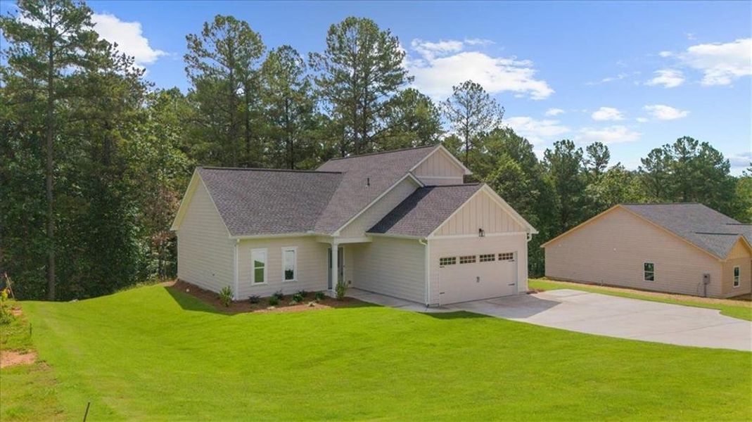 Front exterior of a new home in , Dahlonega, GA, highlighting curb appeal (Image 2). Front exterior of a new home in , Dahlonega, GA, highlighting curb appeal (Image 2).