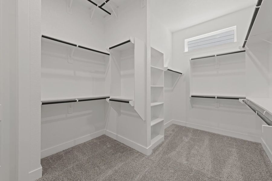 Representative unfurnished interior of a home built from the Rollins by Chesmar Homes in Gregg Ranch, Marble Falls (Image 10).