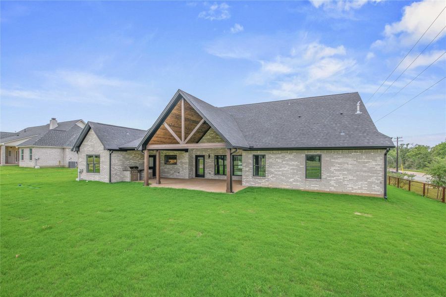 Exterior details and patio area of a home in , College Station (Image 21).