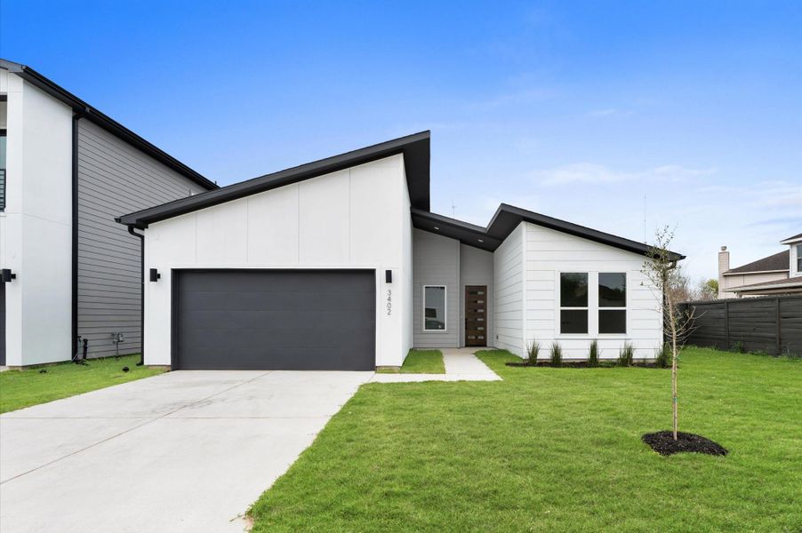 Front exterior of a new home in , Missouri City, TX, highlighting curb appeal (Image 24). Front exterior of a new home in , Missouri City, TX, highlighting curb appeal (Image 24).