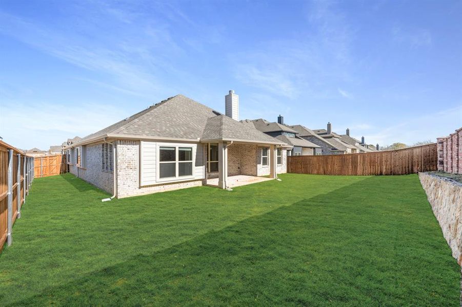 Exterior details and patio area of a home in Mockingbird Hills 60-65, Joshua (Image 23).