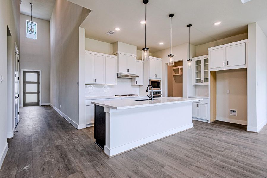 Open-concept living area seamlessly connected to the kitchen Open-concept living area seamlessly connected to the kitchen