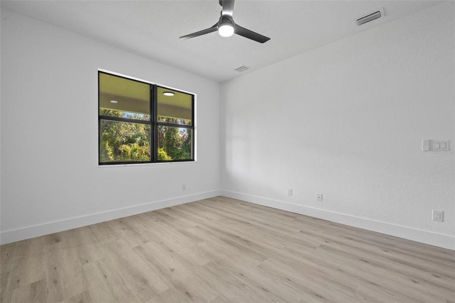 Spacious, unfurnished interior of a new home in , Port Charlotte (Image 30).